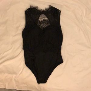 Black lace body suit